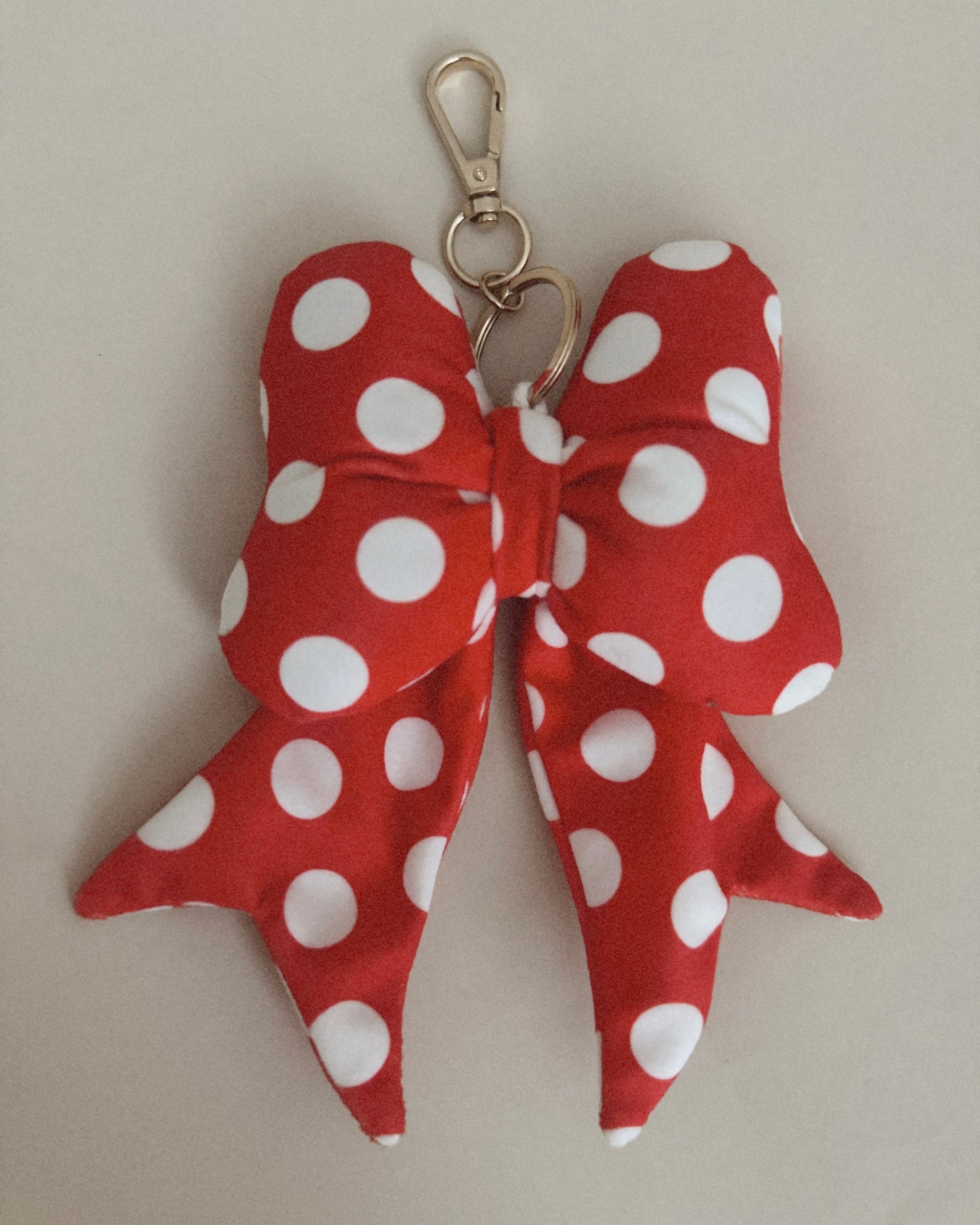 THE BOW BAG CHARM
